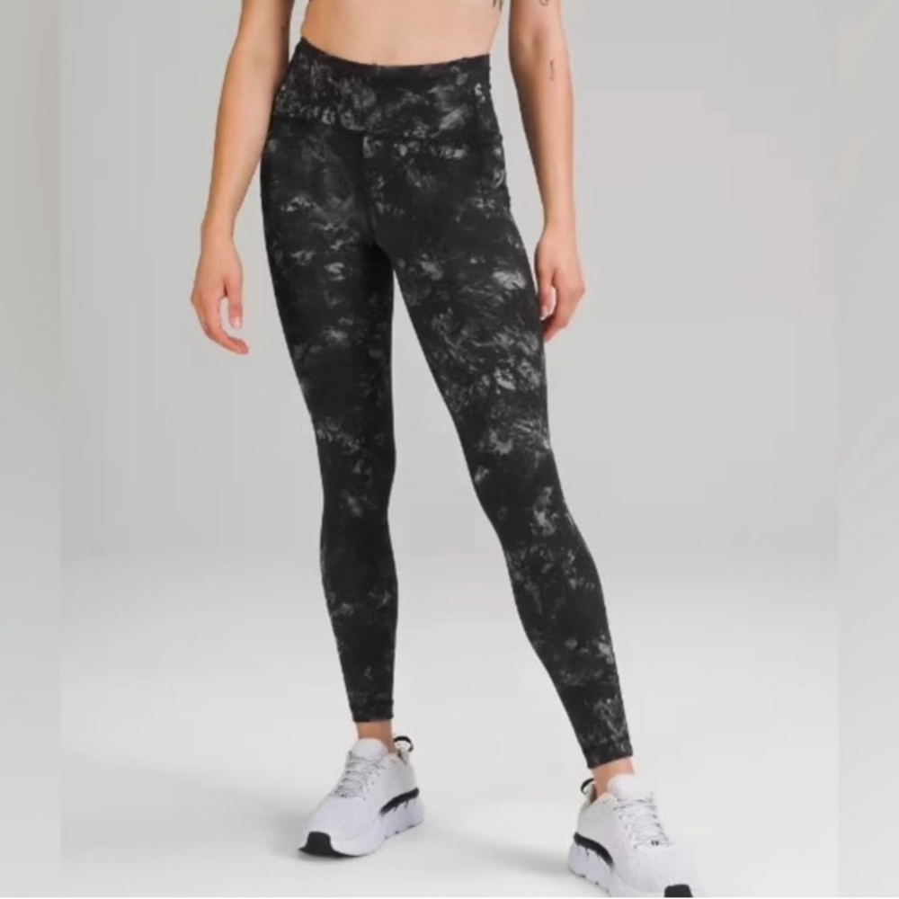 Excellent condition Swift Speed HR Tight 28”. Black / Gray marble.